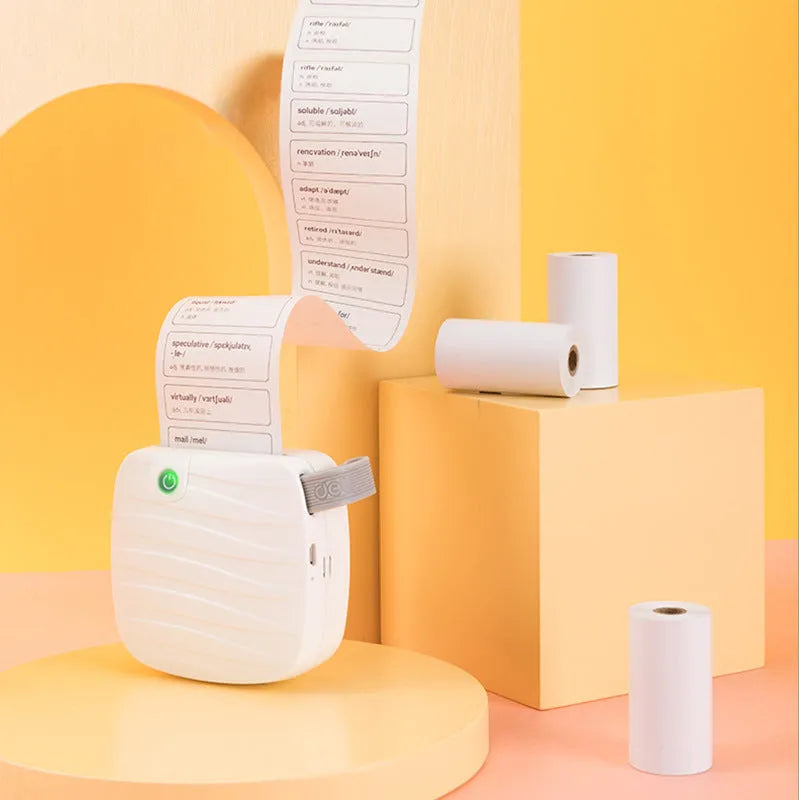 Three rolls of 57mm x 30mm thermal paper in packaging for small printers