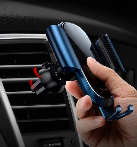 Universal smart car bracket mobile phone holder mounted on dashboard showing adjustable grip
