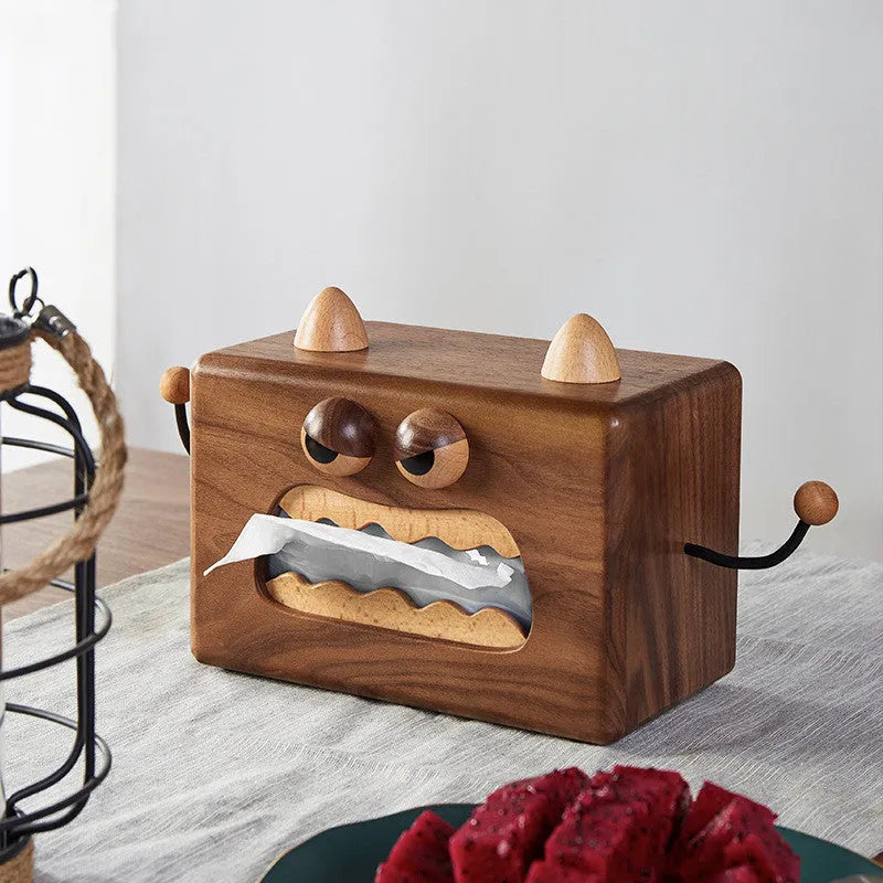 Wooden tissue box with cartoon monster design in walnut beech colour measuring 190x104x125mm