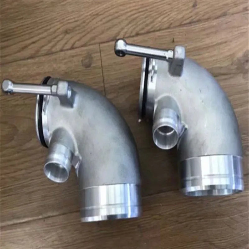 Black aluminium alloy 90 degree turbocharger elbow tube for lateral engine mounting.