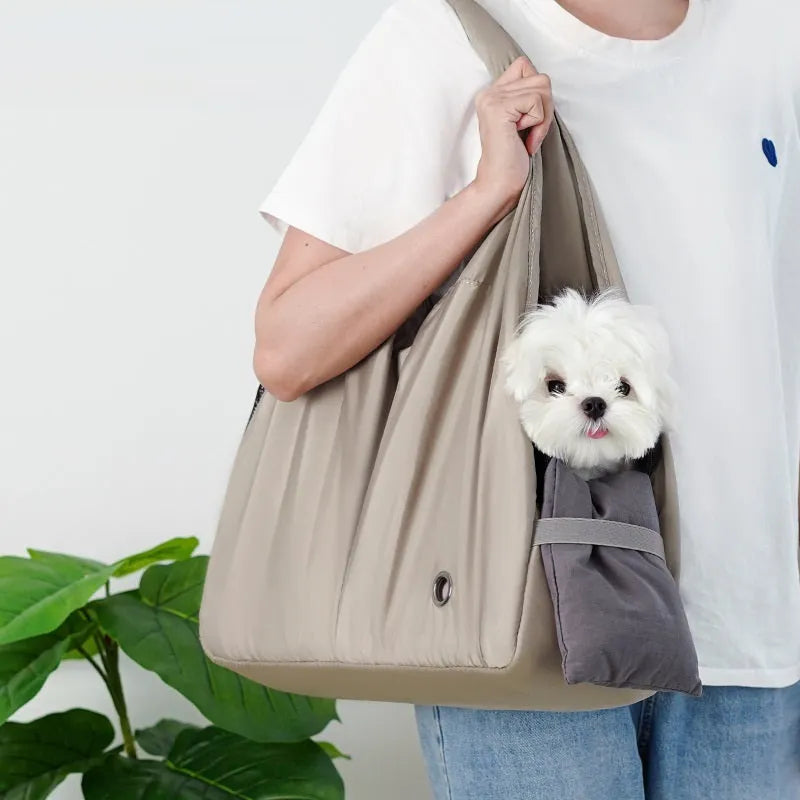 Apricot colour cloth pet carrier handbag with breathable mesh for a cat or small dog.