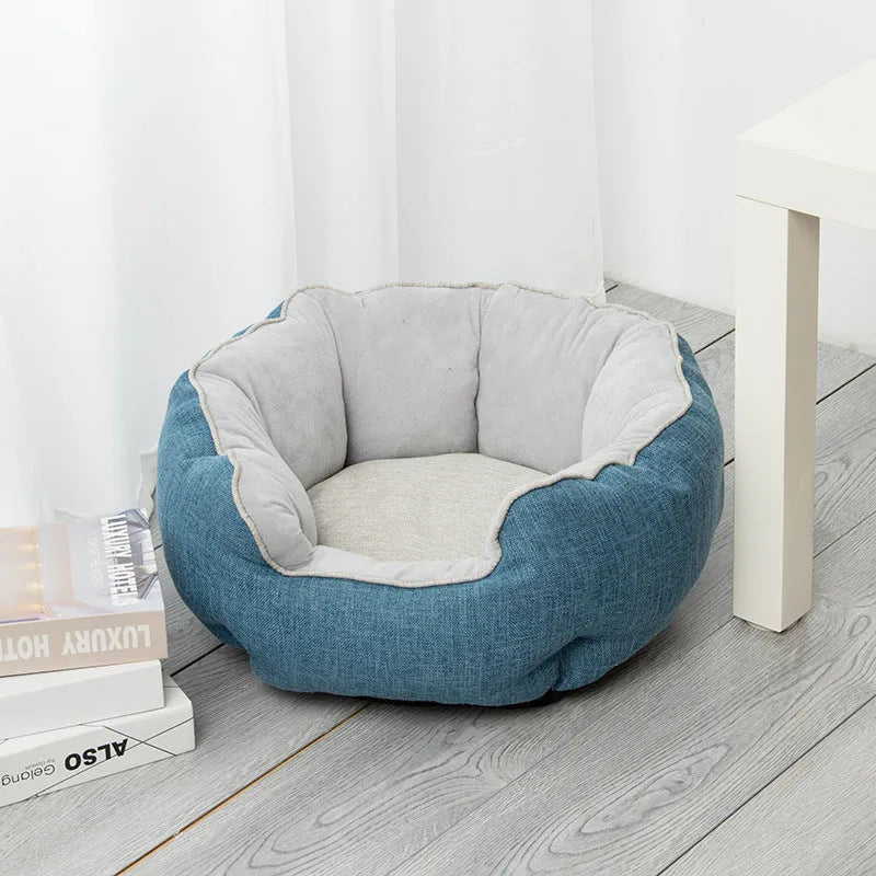 Blue octagonal pet bed with removable mat for a small dog or cat.
