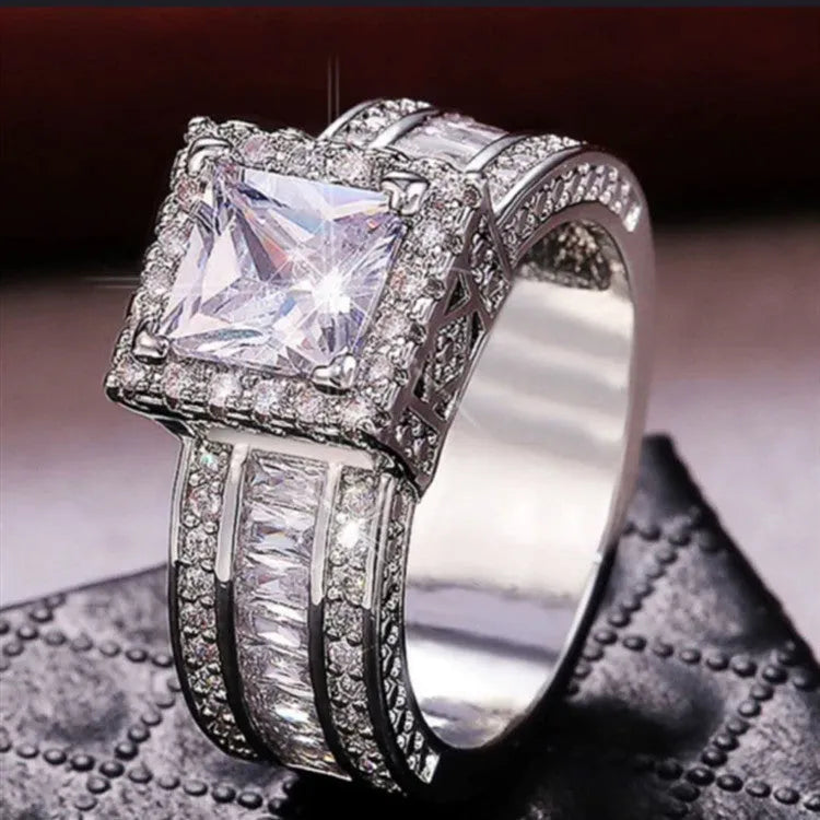 Geometric women's silver fashion ring with round elements in gold and white electroplated finishes