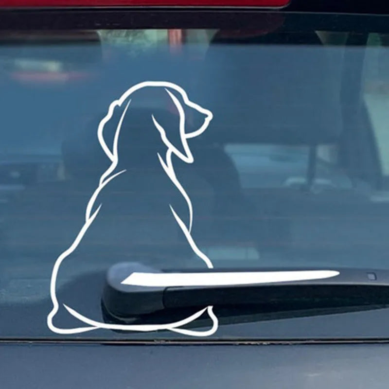 Cartoon dog car rear window sticker with wiper back design in black or white colours.