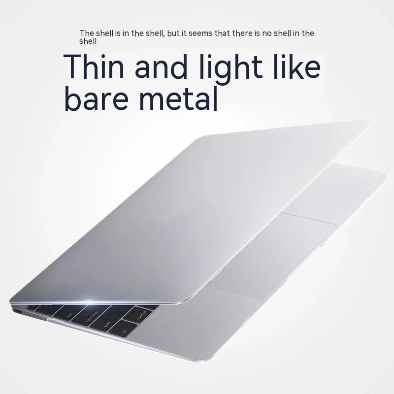 Transparent and frosted hard shell protective case fitted on a MacBook laptop.