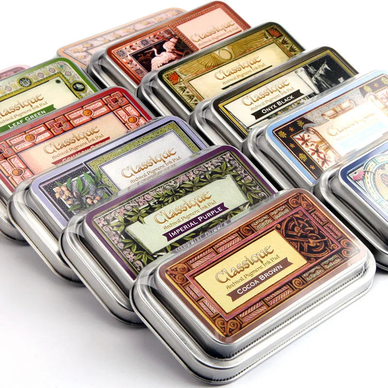 Rectangular oily stamp pad for rubber stamps in five colour options on craft table