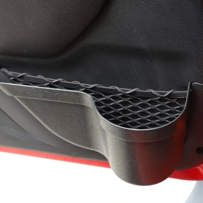 Black aluminium alloy car interior storage box with a net pocket for organising sunglasses and phones.