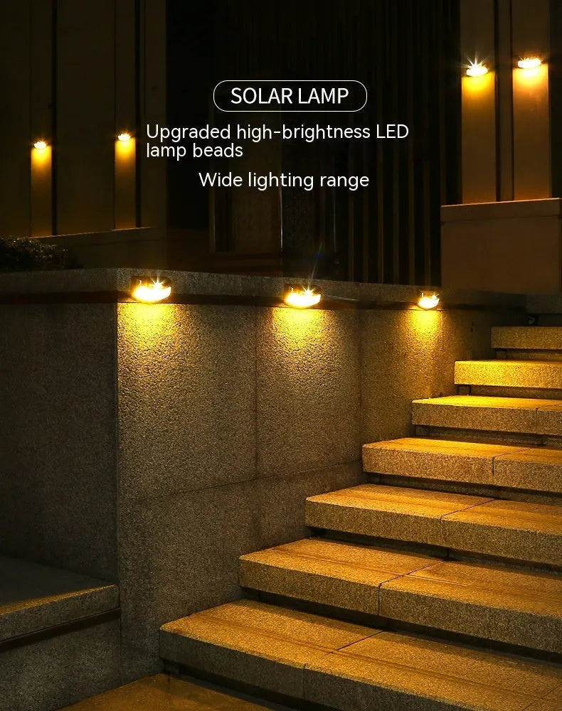 Solar-powered outdoor wall lamp with smiling face design for garden courtyard lighting