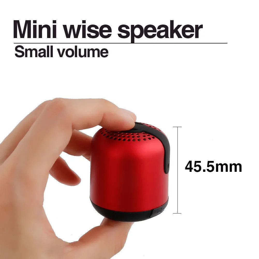 Hieha XQ11 cylindrical mini Bluetooth speaker in silver colour on a table