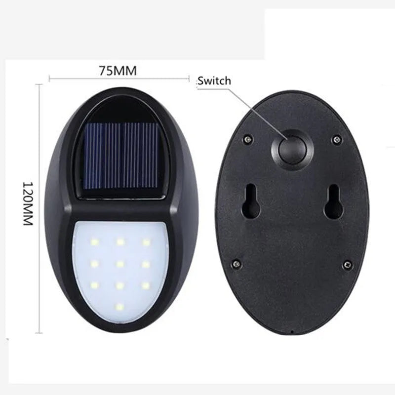Black solar-powered LED wall light with automatic light sensor for outdoor garden use
