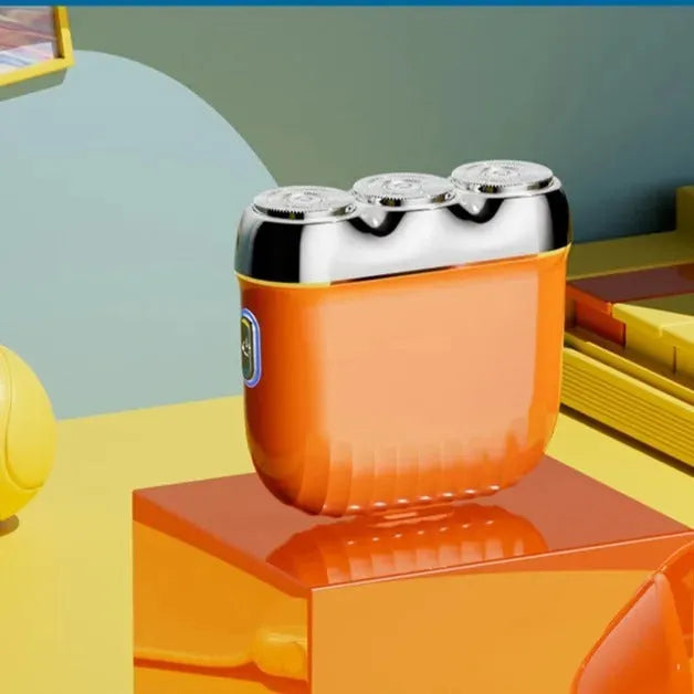 Three-head magnetic mini electric shaver in gun metal, orange, green, or blue colours with floating cutter design