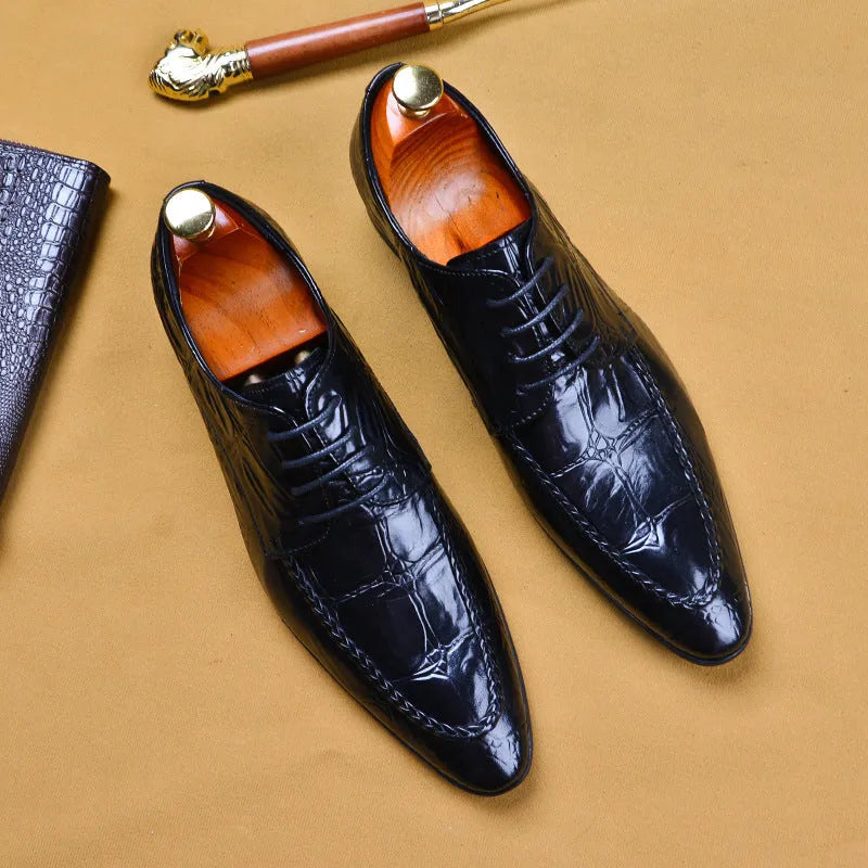 Men's black and brown leather shoes with alligator pattern texture and horse bit buckle detail