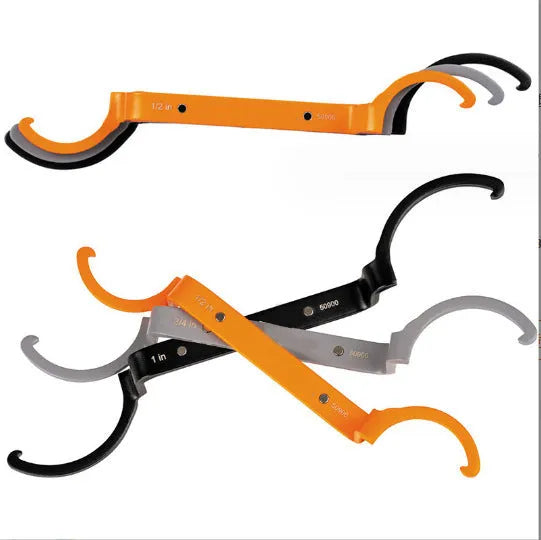Three crescent wrenches with magnetic suction and catheter locking in orange, grey, and black colours