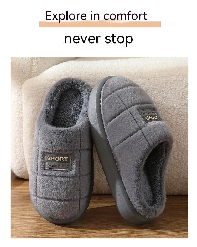 Men's grey plaid slippers with rabbit hair upper and EVA sole, showing toe holder design