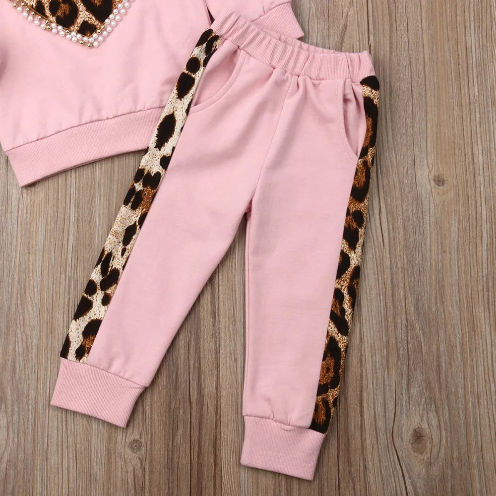 Pink cotton print sweatshirt two-piece loungewear set on model