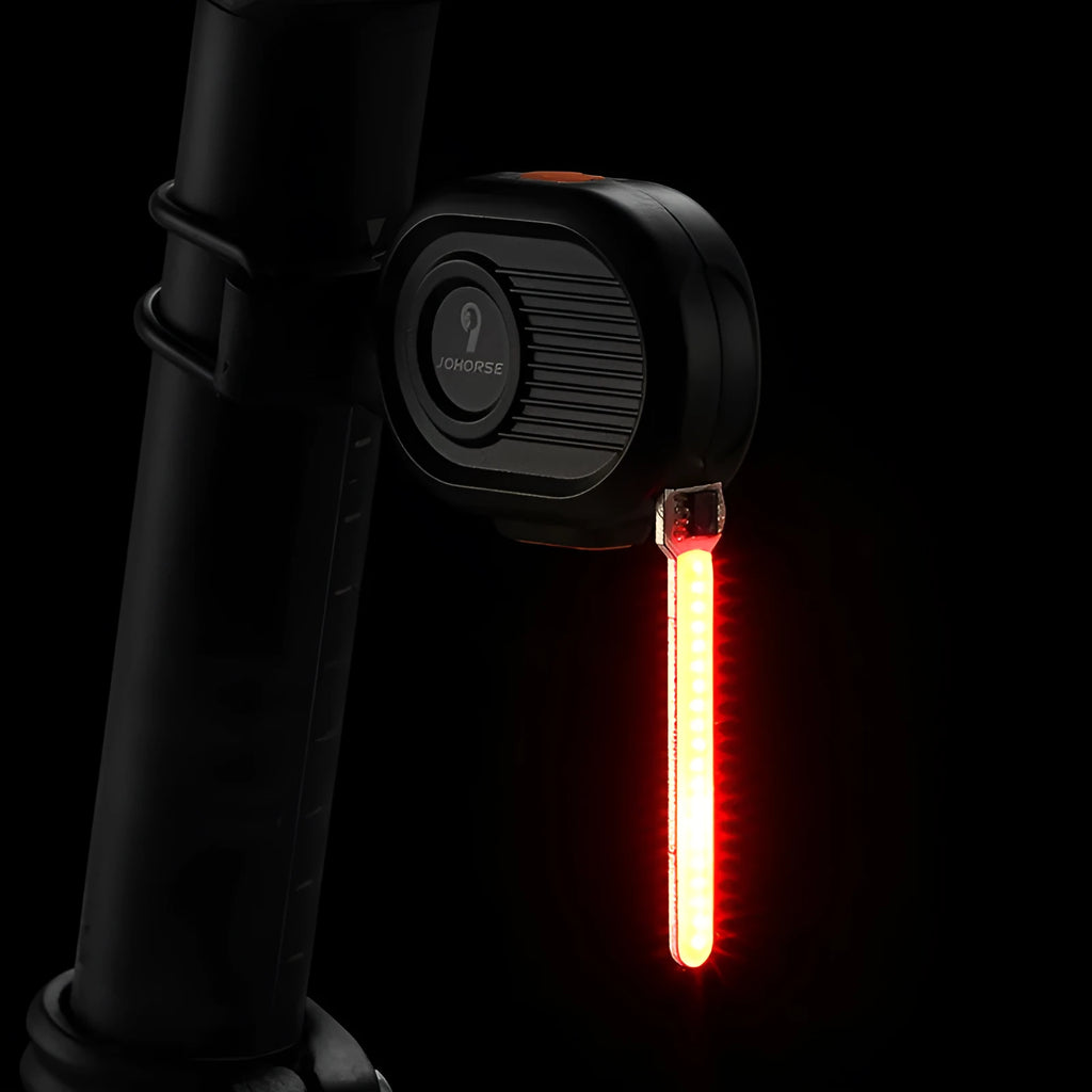 Bicycle running water taillight with COB LED showing waterfall effect in multiple colours