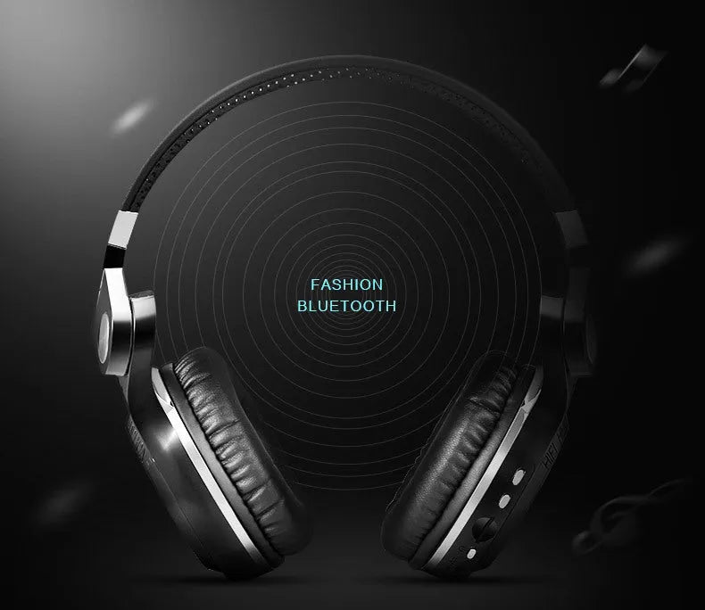 Wireless over-ear Bluetooth headset with card plug-in, shown in available colours: white, red, blue, black.