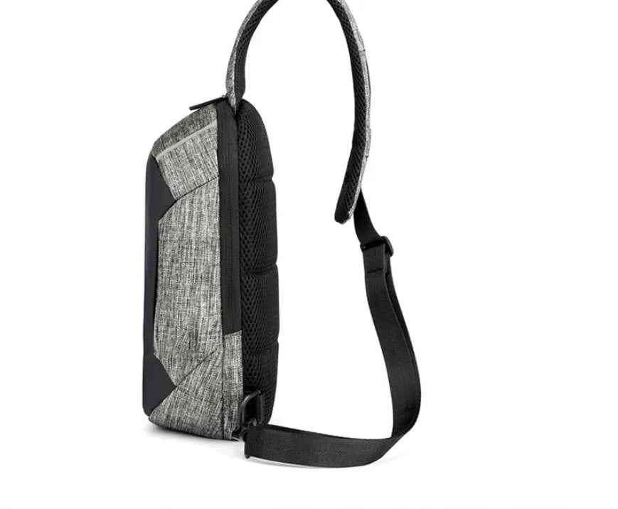 Small dark blue Oxford cloth waterproof chest bag with a zipper and adjustable strap, shown with a phone in the dedicated compartment.