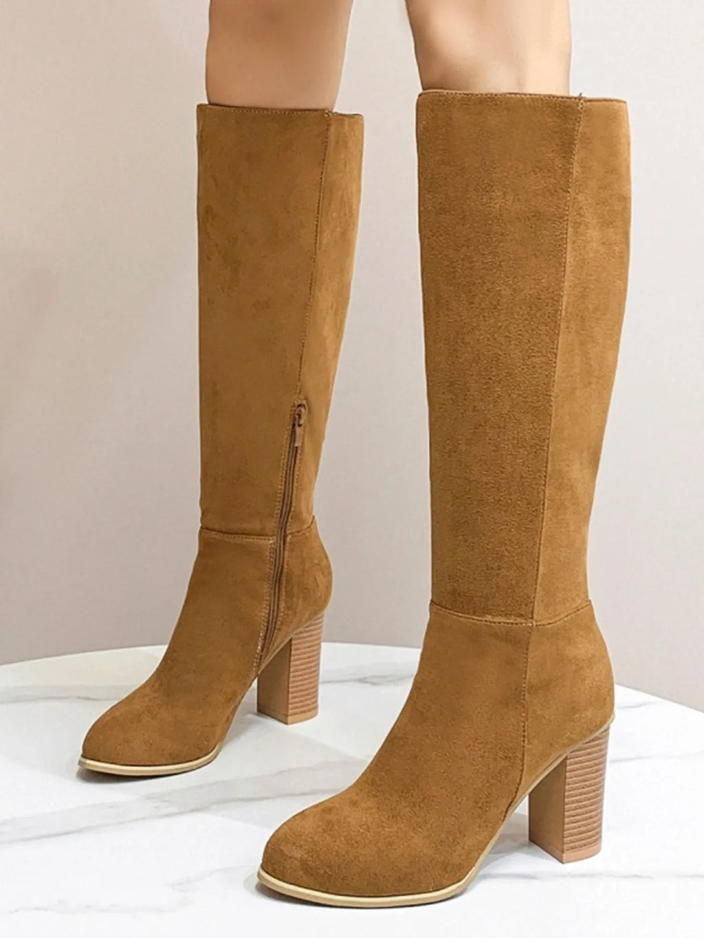 Women's black square toe high heel fashion boots made from PU leather