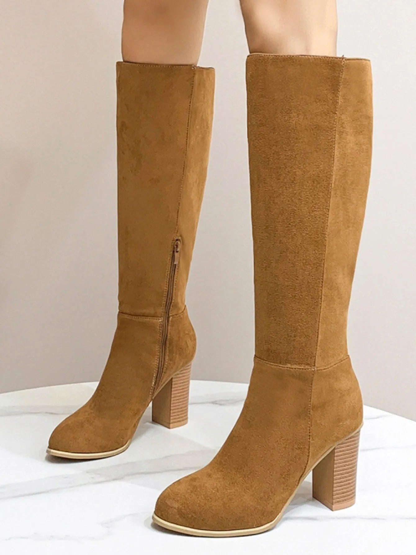 Women's black square toe high heel fashion boots made from PU leather
