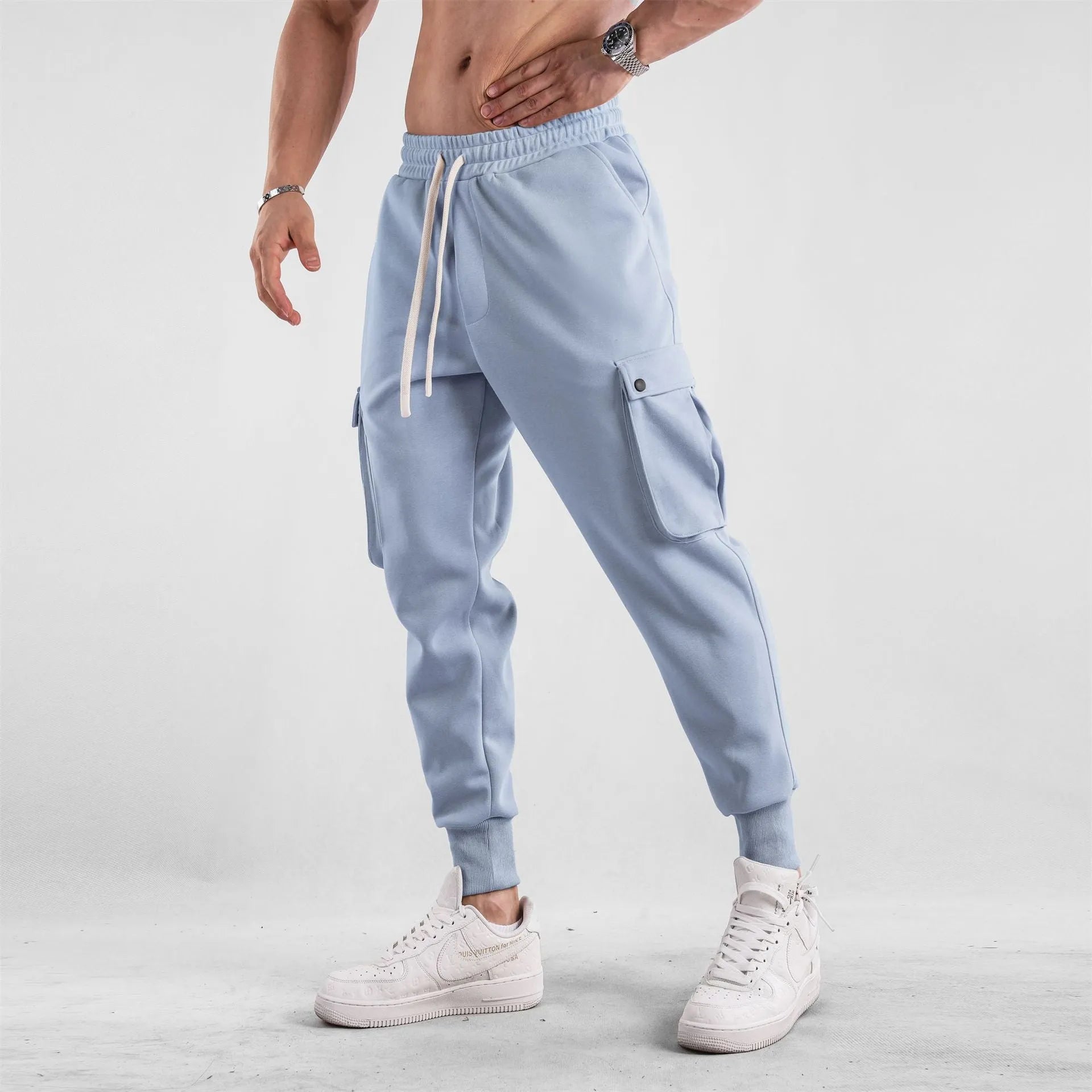 Men's loose cotton sports trousers with multi-pockets and ankle-tied cuffs in six colour options