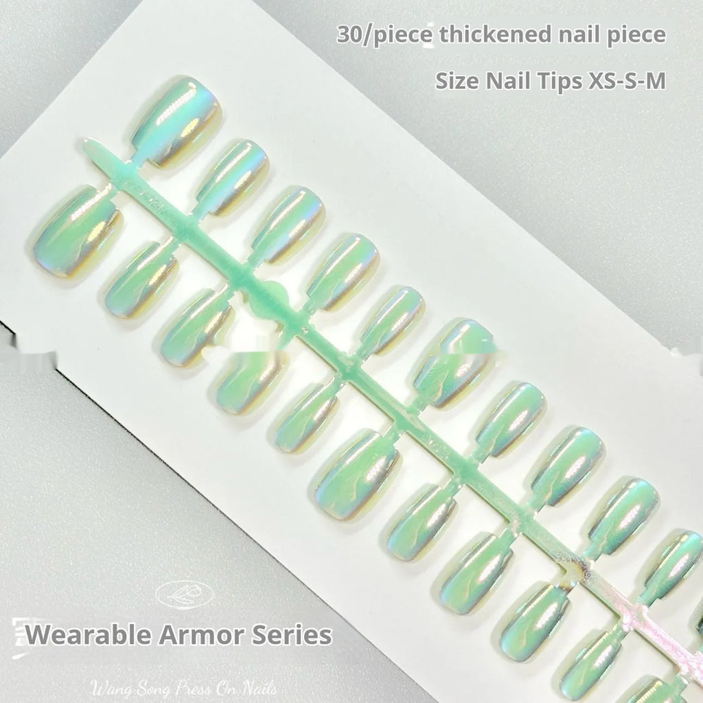 Electroplated Cat's Eye press-on nails in short ladder shapes with XS, S, and M sizes showing Aurora and solid colour designs