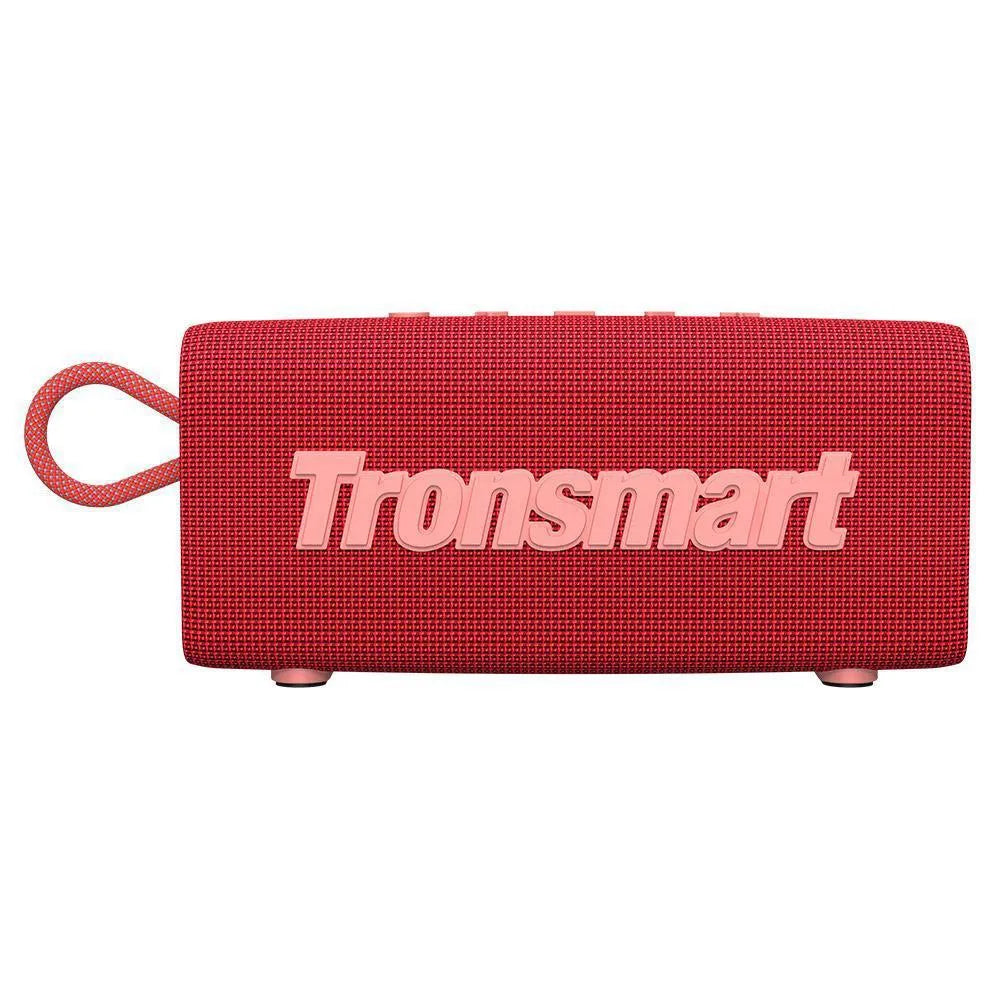 Portable waterproof Bluetooth speaker in multiple colour options on a outdoor surface.