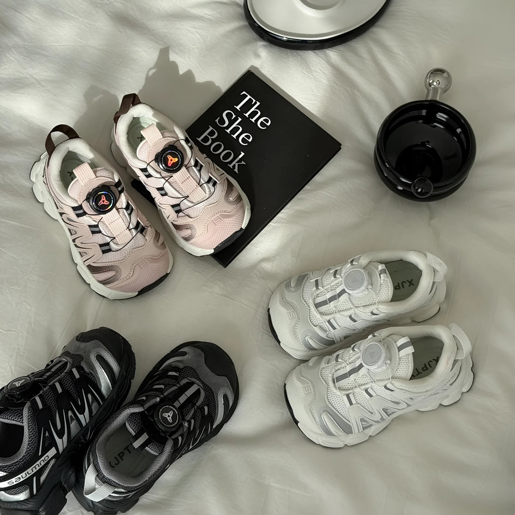 Girls' lightweight casual flats in black, beige, or pink with a breathable mesh upper.