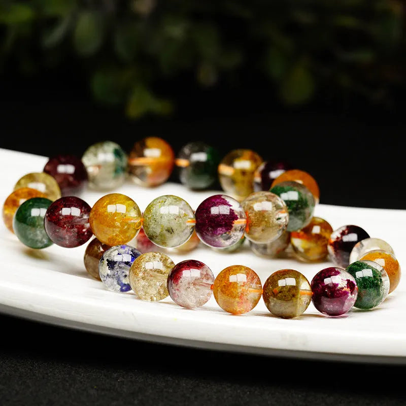 Natural crystal bracelet with colourful ghost cornucopia ethnic design featuring 10mm spherical beads
