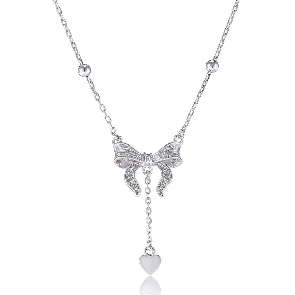 S925 silver necklace with heart-shaped pendant featuring butterfly and bow design on adjustable O-ring chain