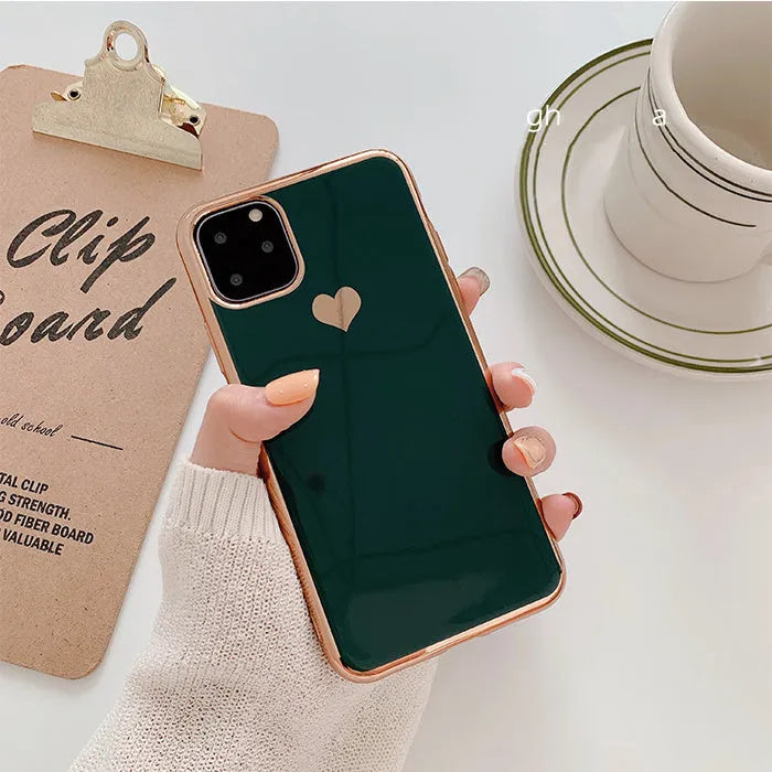 Slim TPU iPhone case in a solid colour with a luxury plating love design, shown fitted to a phone.