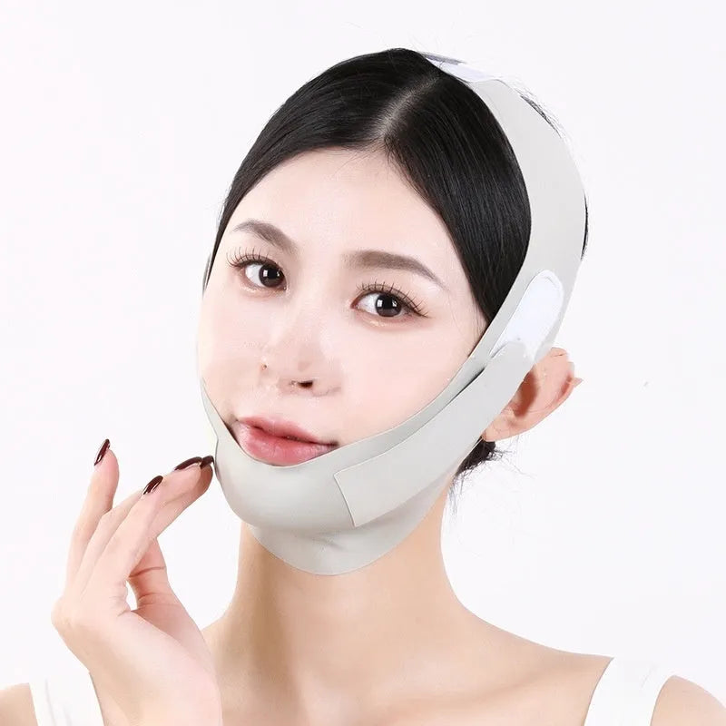Graphene fabric face shaping mask in purple and green colours for facial contouring