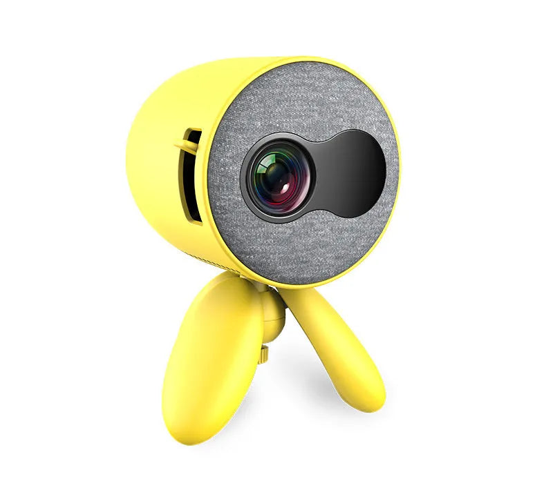 YG220 portable LED projector in white or yellow colour on a table projecting a movie scene.