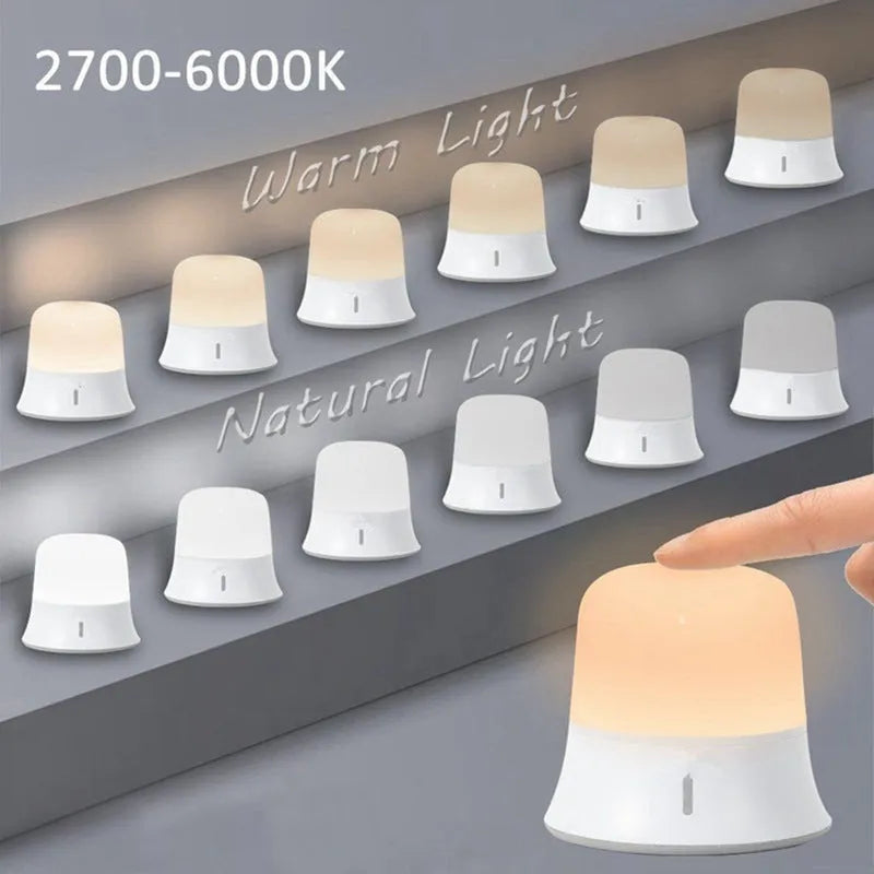 White bedside touch night light showing dimming control and colour change features