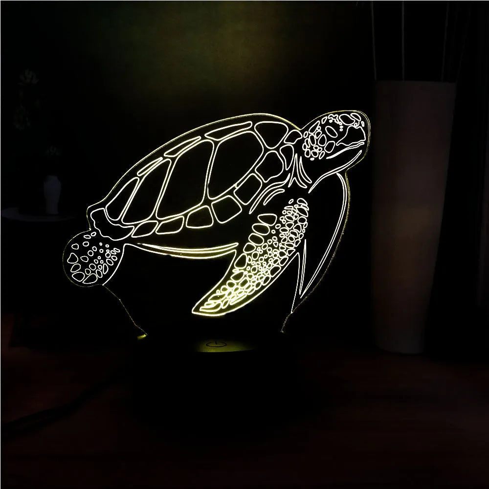 3D LED turtle night light with acrylic base showing multi-colour illumination and remote control