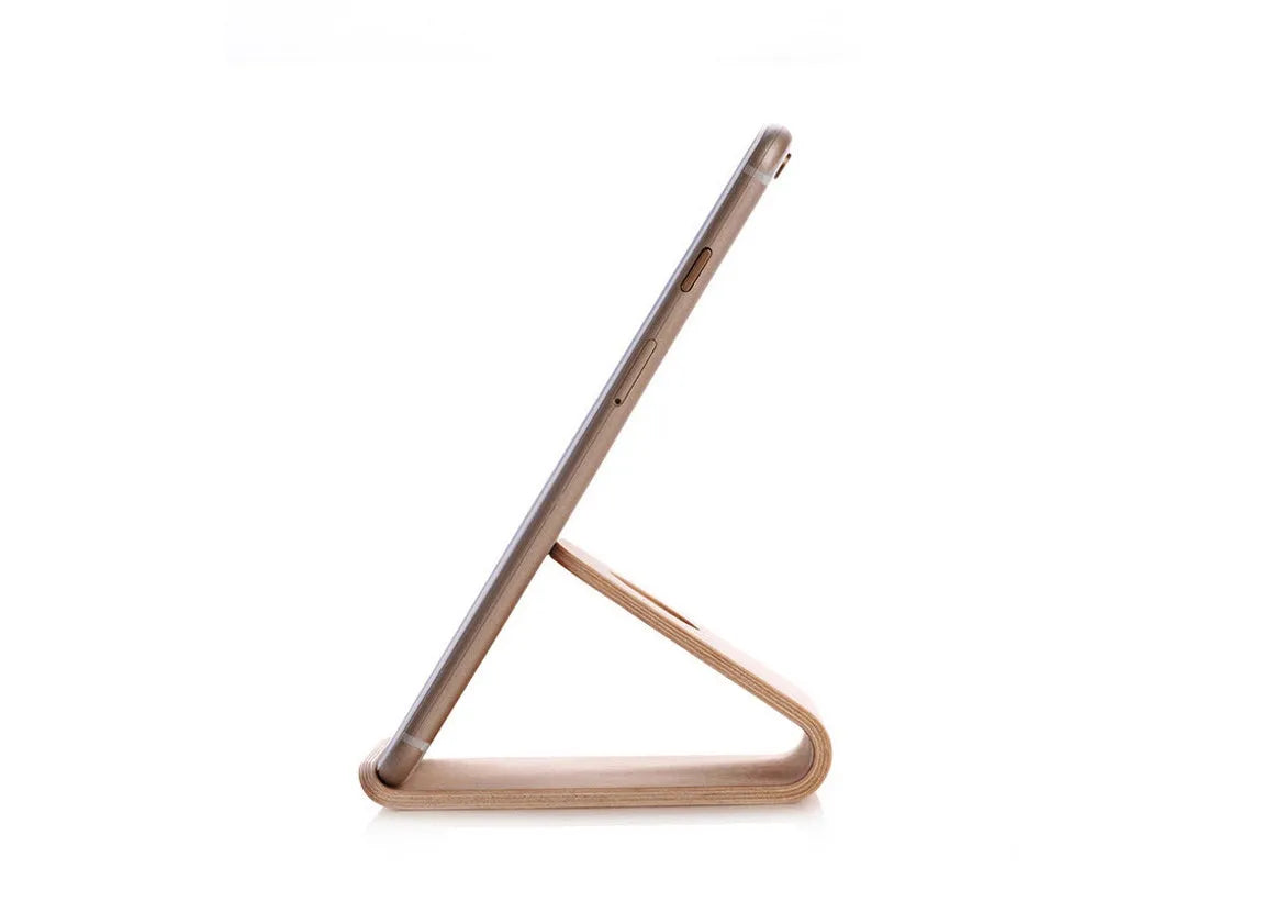 Solid wood phone stand for iPhone in natural walnut or white maple finish with minimalist bracket design