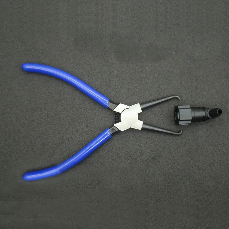 Iron and rubber caliper tubing pliers for automotive fuel line maintenance.