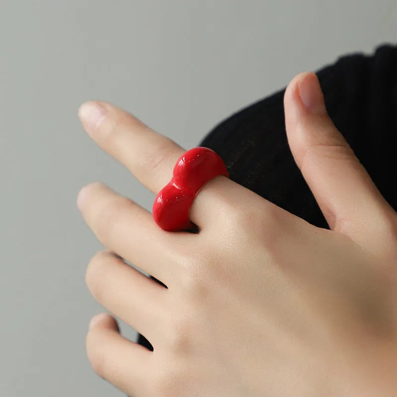 Heart shape three-dimensional enamel ring showing raised design with coloured finish options