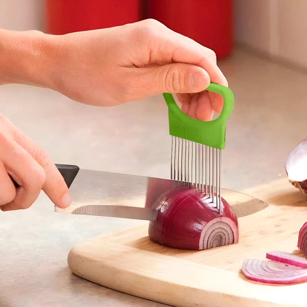 Vegetable holder cutting aid with stainless steel needle and easy-grip handle on a kitchen counter