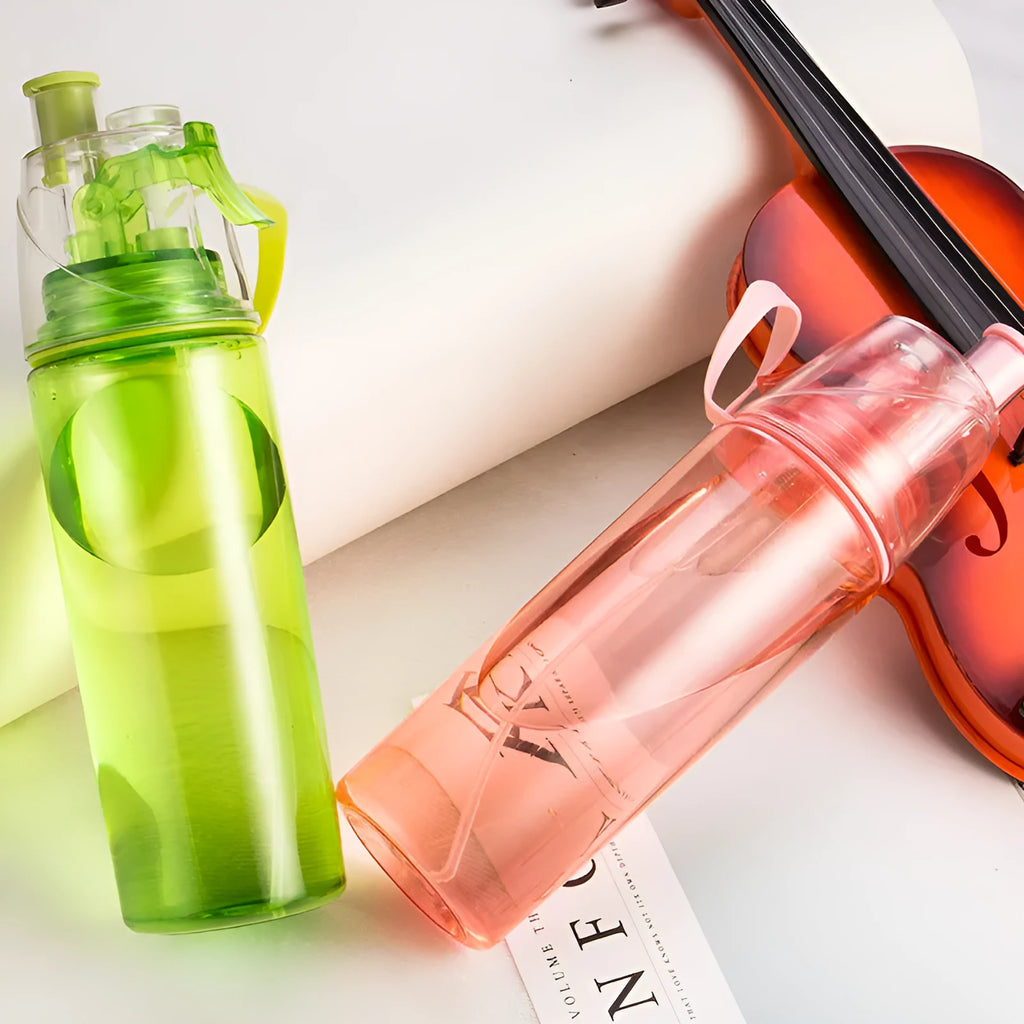 600ml spray water bottle in pink with mist spray function for cycling and outdoor use