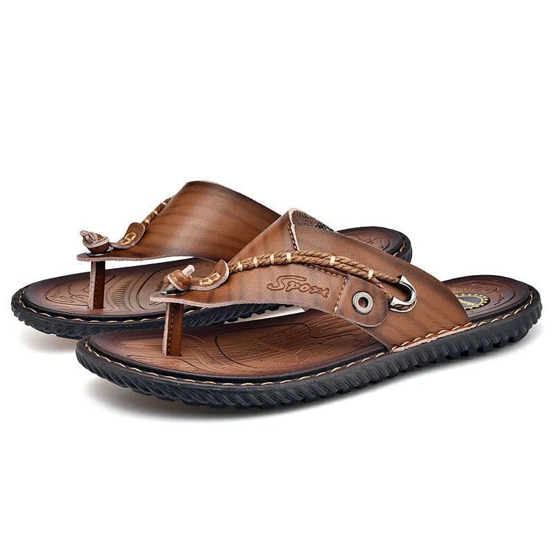 Men's black non-slip casual slippers with PU leather upper showing sole tread pattern