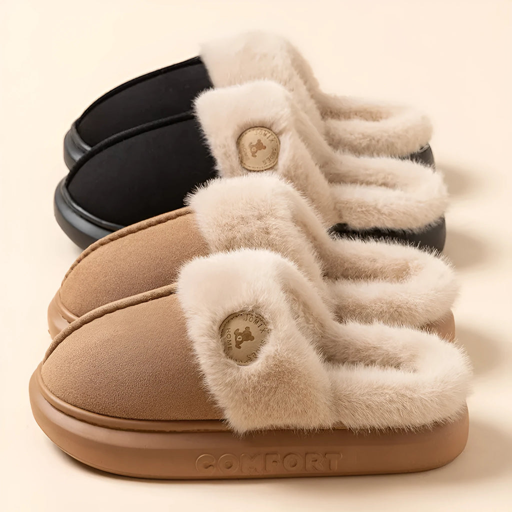 Plush fleece slipper with thick PVC sole and car stitching, shown in blue colour.