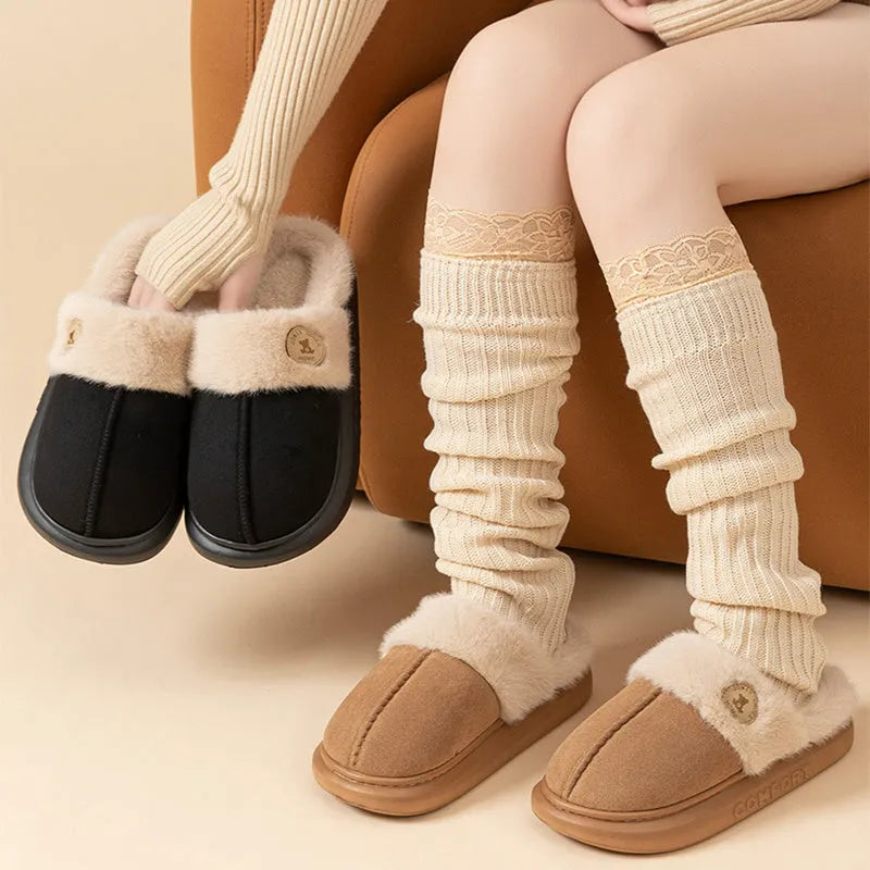 Plush fleece slipper with thick PVC sole and car stitching, shown in blue colour.