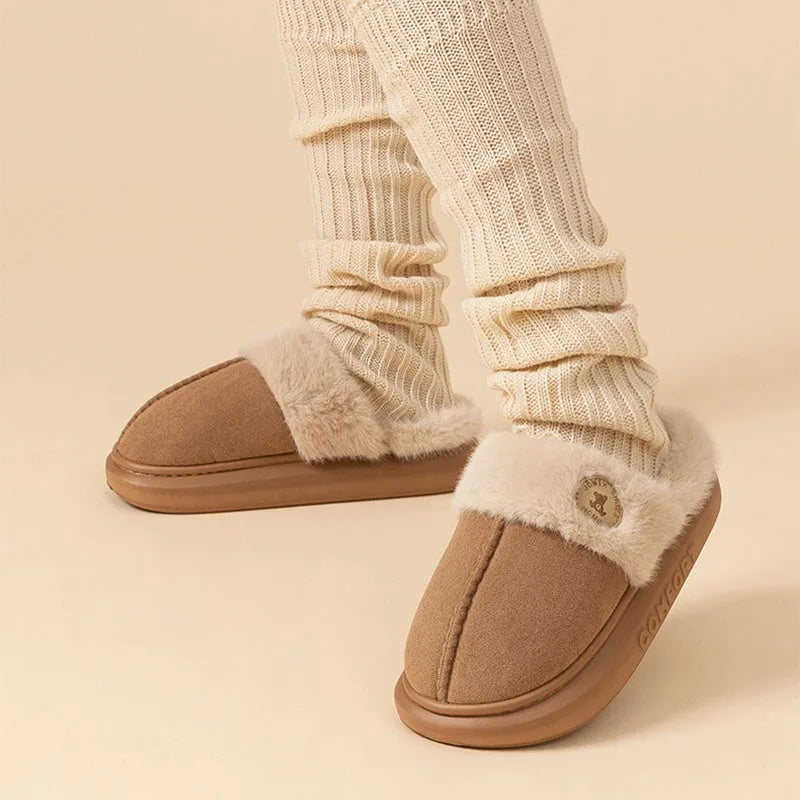 Plush fleece slipper with thick PVC sole and car stitching, shown in blue colour.