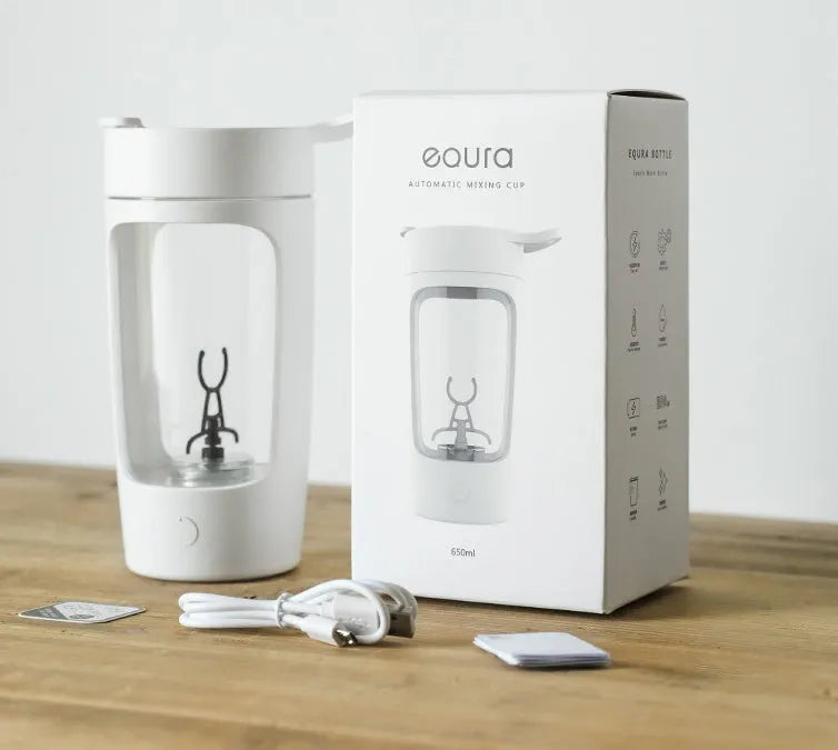 Portable automatic mixing blender cup in black, blue, pink, or white, showing compact size
