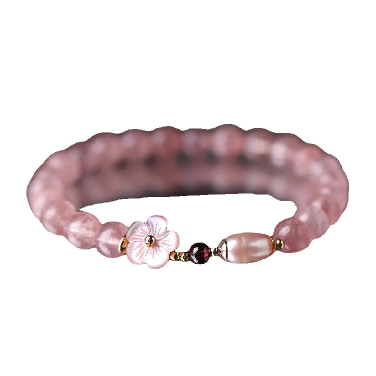 Strawberry quartz crystal flower bracelet with adjustable fastening on wrist