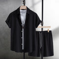 Men's loose cotton blend beach suit with short sleeve cardigan shirt and shorts in black.