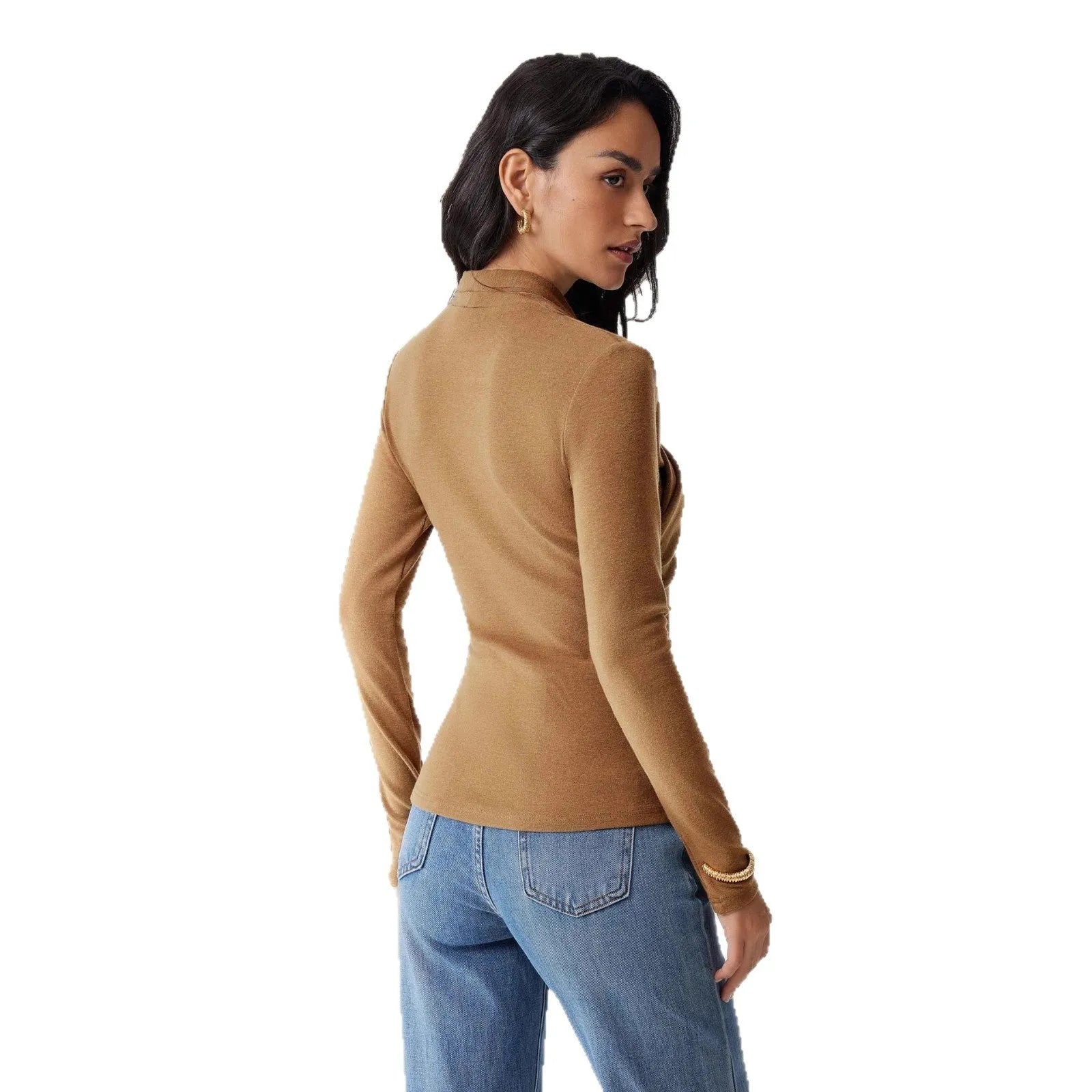 Camel coloured women's slim fit long sleeve pullover sweater on a hanger