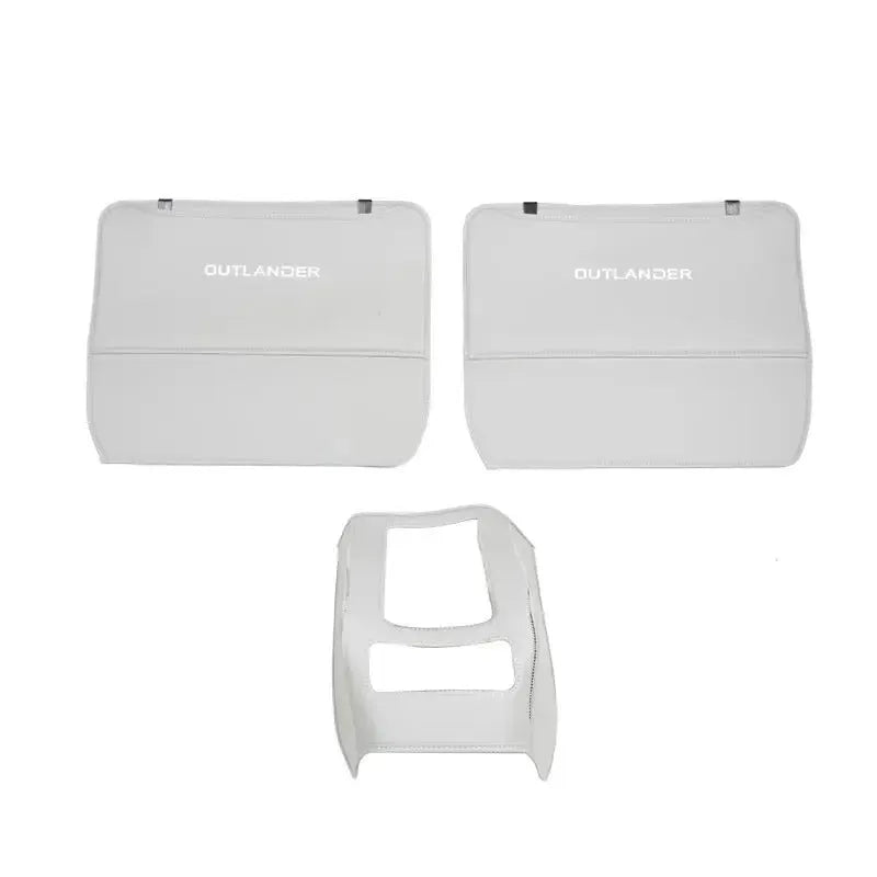 Set of three black leather anti-kick pads for 2023 Outlander seat and console protection.