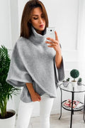 Women's long black batwing sleeve cardigan sweatshirt with three buttons and extended length